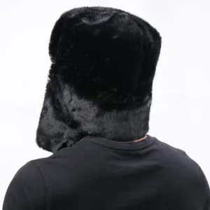 Detailed view of the black winter warm earflap ushanka hat, thick fluffy plush design.