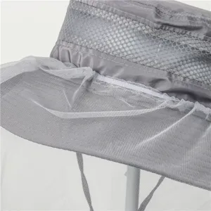 Outdoor fishing hat detail view showing breathable mesh and fine anti-mosquito net structure.