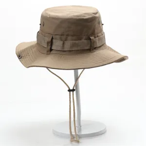 Detail view of khaki outdoor cotton bucket hat featuring chin strap and air ventilation.