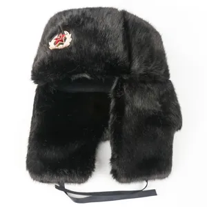 Black faux fur ushanka winter hat with Soviet red star badge, warm thermal ear protection.