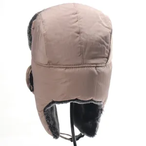 Detailed view of the winter warm ushanka hat showing thick faux fur lining and windproof fabric.