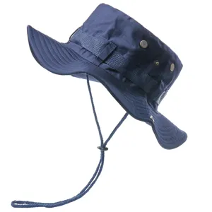 Detailed view of dark blue outdoor bucket hat, windproof chin strap, breathable eyelets.