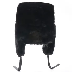 Detailed view of a black winter ushanka hat with earflaps, thick thermal plush for cold weather.
