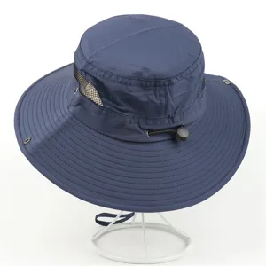 Navy blue outdoor sun hat for summer, breathable mesh bucket hat with wide brim and cord.