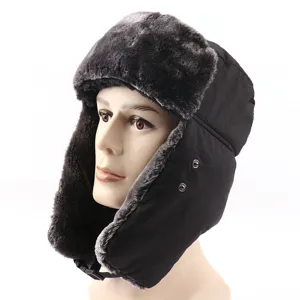 Detailed view of the winter windproof ushanka hat with soft grey faux fur lining.