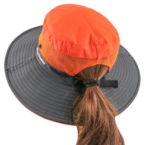 Kids outdoor sun hat with ponytail hole, orange and grey bucket hat for hiking and daily wear.