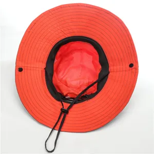 Red kids outdoor sun hat detail shot, showing breathable mesh inner lining and chin strap.