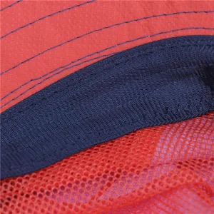 Close-up detail of children's outdoor sun hat interior showing breathable mesh and stitching.