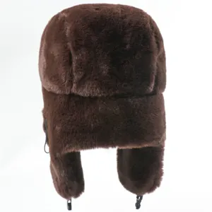 Close-up detail showing the thick brown faux fur texture of the winter bomber hat earflap.