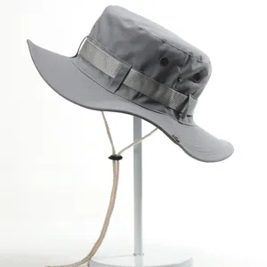 Grey outdoor cotton bucket hat with chin strap and eyelets for sun protection and hiking.