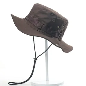 Brown outdoor bucket hat with adjustable chin strap and breathable eyelets for sun protection.