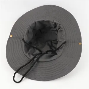 Detail view of dark gray cotton outdoor bucket hat with black drawstring and side snaps.