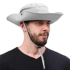 Closeup of breathable wide brim sun hat with mesh and chin strap for outdoor activities.