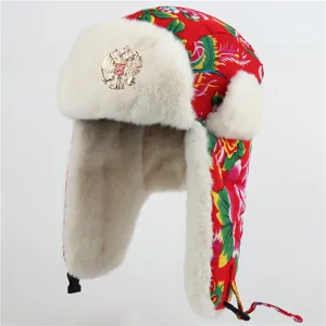 Winter warm Russian style ushanka hat with floral pattern and thick plush earflaps.