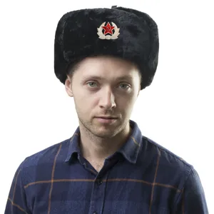 Detailed close-up of the thick warm winter ushanka hat with iconic Soviet badge design.