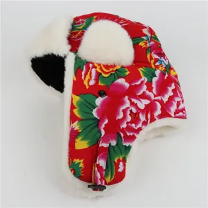 Thickened winter earflap ushanka hat with traditional floral print and plush faux fur lining