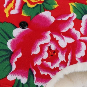 Thick winter ushanka hat detail, vintage floral print fabric with soft plush lining.