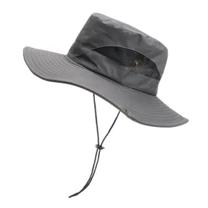 Grey outdoor sun hat with breathable mesh and adjustable chin strap for hiking and travel.