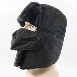 Detailed view of the winter thermal trapper hat with integrated windproof face mask.