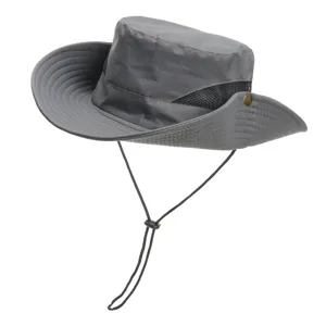 Grey outdoor sun hat with breathable mesh and wind strap, perfect for hiking and summer travel.