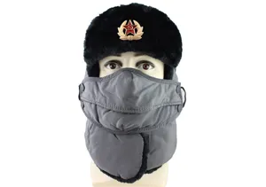 Winter black ushanka hat with Soviet red star badge and grey face mask for outdoor cold weather.