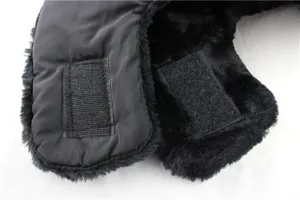 Black winter thermal earflap hat with soft plush lining and convenient velcro strap design.