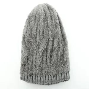 Cozy grey fleece-lined knit beanie hat, soft plush texture, warm winter headwear detail.