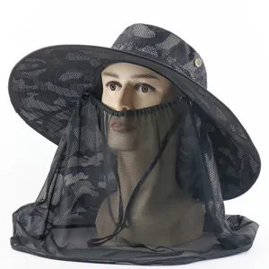 Detailed view of the camouflage bucket hat featuring an extra-large brim and mosquito net.