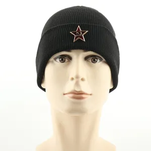 Unisex black knitted beanie hat featuring a Soviet red star hammer and sickle badge design.