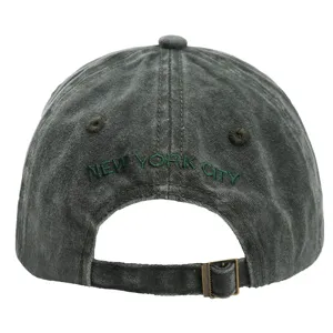 Washed cotton baseball cap for men and women, vintage style with green embroidery detail.