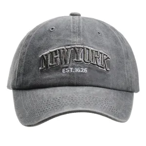 Close-up detail of the grey washed cotton baseball cap with stylish embroidered text front.