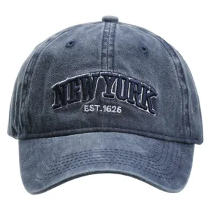 Washed cotton baseball cap for men and women, classic blue denim look with front embroidery.