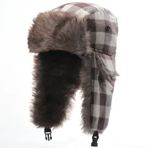 Brown plaid ushanka hat with thick faux fur lining for winter outdoor sports and skiing