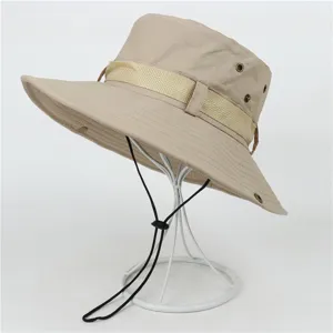 Detailed view of breathable summer outdoor bucket hat with windproof chin strap, beige color.
