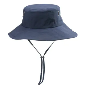 Outdoor bucket hat detail showing quick-drying fabric, adjustable chin strap and metal eyelets.