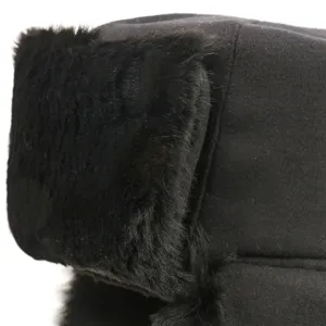 Black winter warm trapper hat with thick plush ear flaps, windproof outdoor snow cap for cold days.