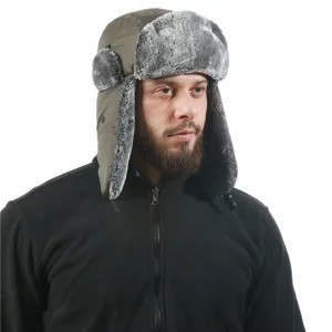 Warm winter trapper hat with soft faux fur earflaps and windproof shell for outdoor wear.