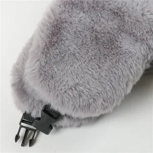 Grey faux fur hat detail showing soft plush texture and black plastic buckle strap.