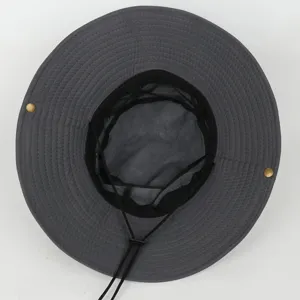 Dark grey sun hat detail, showing breathable mesh lining, adjustable chin strap, and snap buttons.