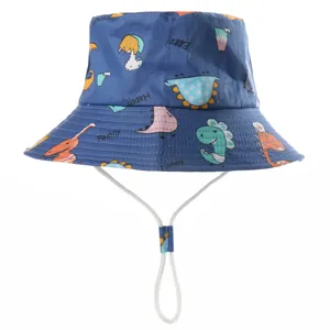 Kids cotton bucket hat with cute dinosaur prints, perfect for outdoor summer sun protection.
