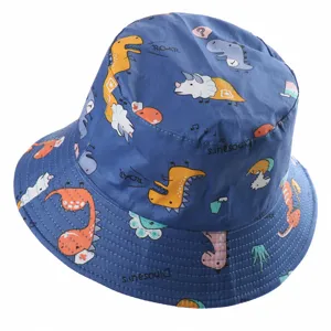 Kids blue cotton bucket hat with cute dinosaur cartoon prints, perfect for outdoor sun protection.
