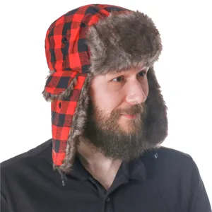 Close up detail of red and black buffalo plaid ushanka trapper hat with soft warm faux fur.