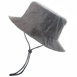 Grey bucket hat detail shot, showing adjustable black chin strap and fine stitching.