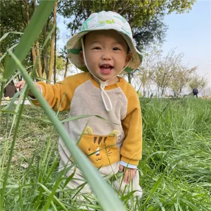 Kids outdoor sun protection bucket hat cute cartoon cotton fisherman cap close up view