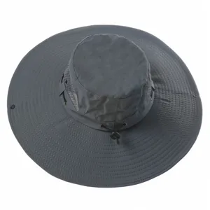 Close-up detail of the grey outdoor sun hat showing wide brim and breathable mesh design.