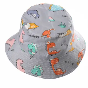 Kids cotton dinosaur print bucket hat detail showcasing cute animal sun protection.