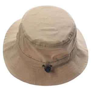 Khaki bucket hat detail showing adjustable drawstring toggle and side breathable eyelets.