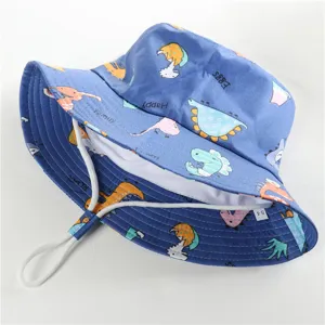 Kids blue dinosaur print bucket hat with adjustable chin strap, cute cotton sun hat for outdoor.