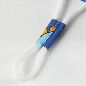 Children sun hat detail view showing white adjustable cord and cute cartoon print adjuster.
