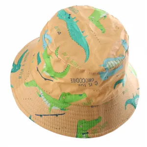 Kids cotton bucket hat with cute cartoon crocodile print and sun protection outdoor wear.
